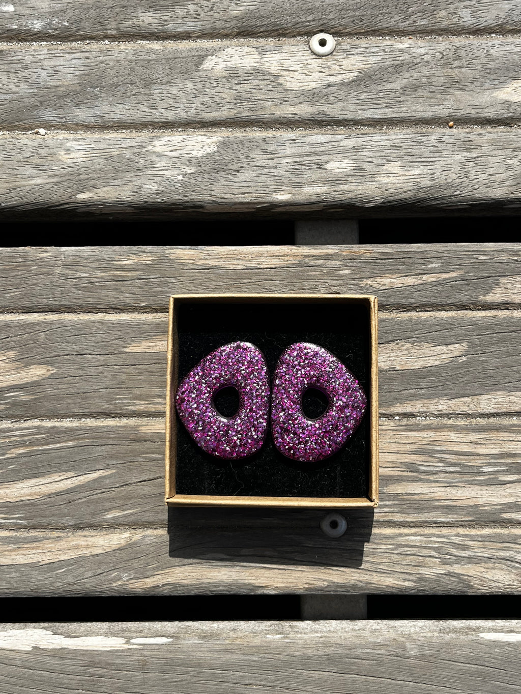 Boucle ovale violette