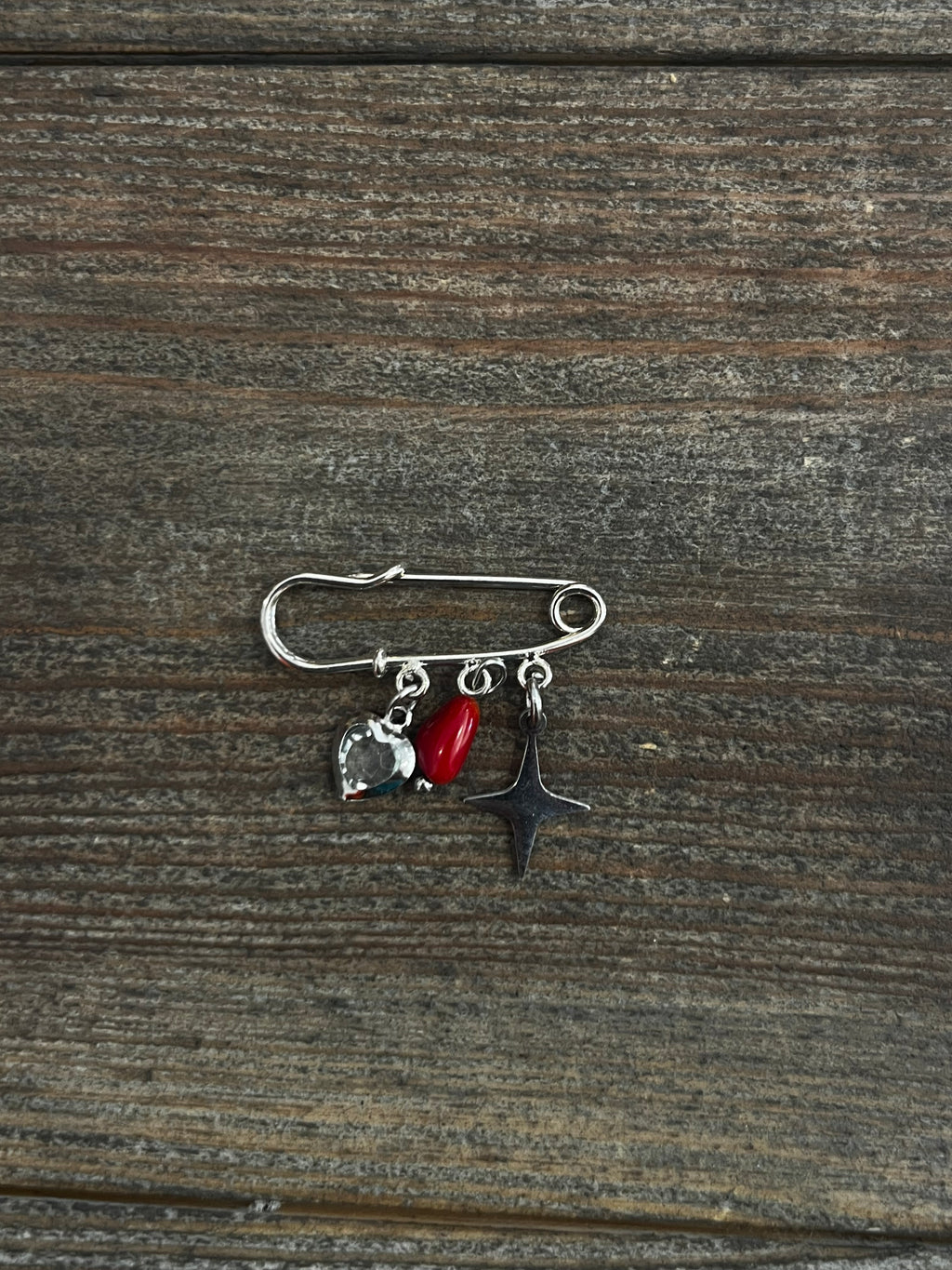 Petite broche plaquée argent