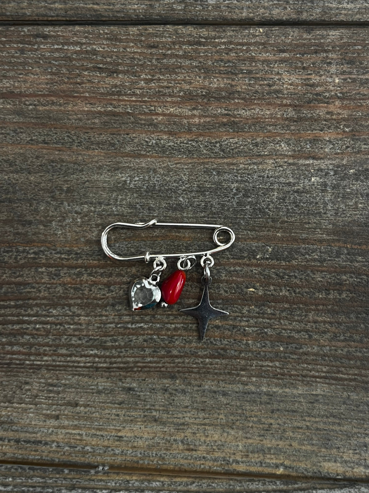 Petite broche plaquée argent