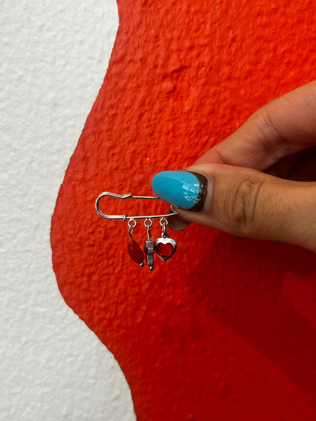 Petite broche plaquée argent