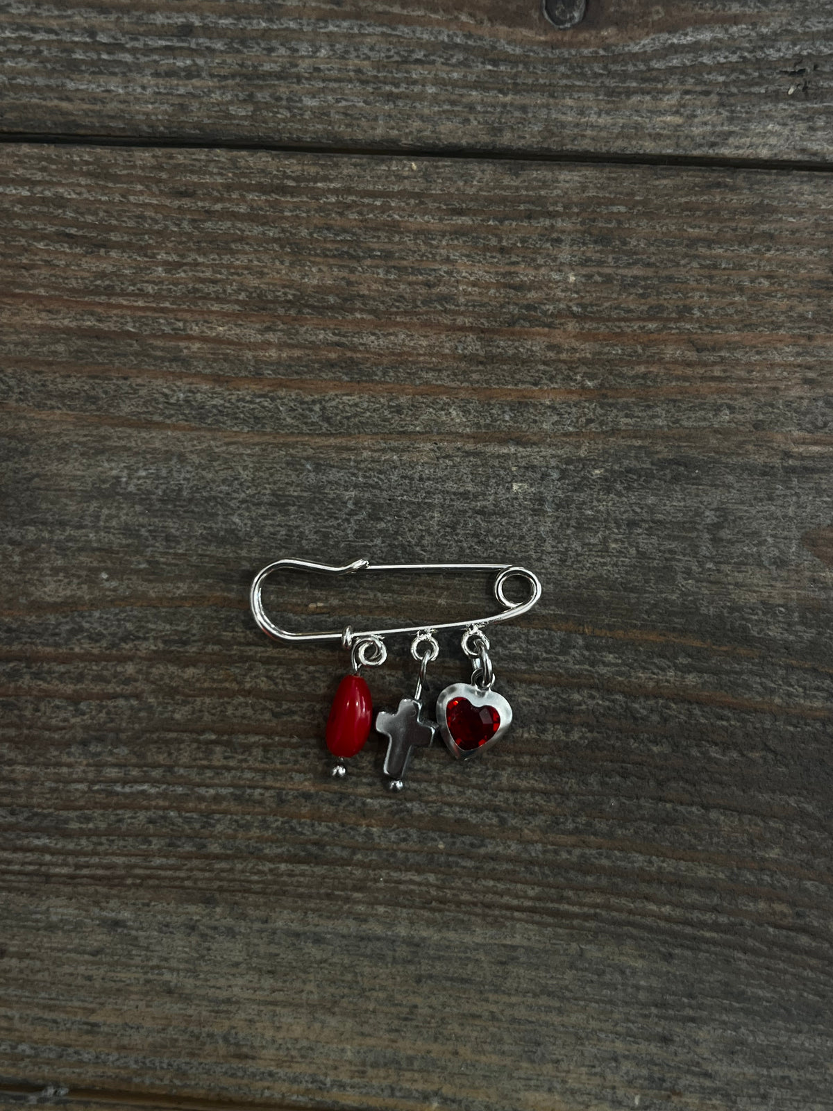 Petite broche plaquée argent