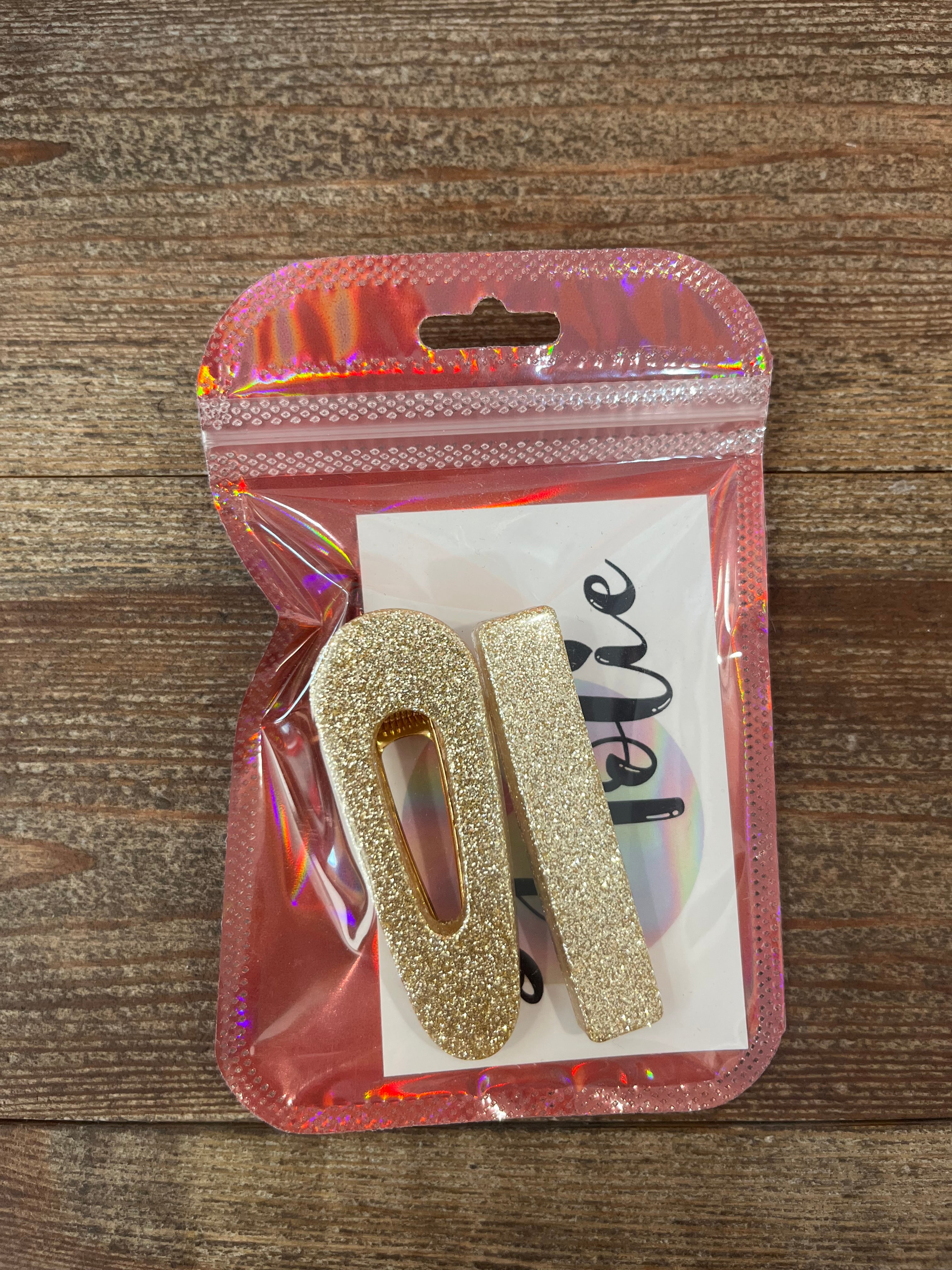 Barrettes beiges/dorées en résine