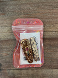 Barrettes dorées 2 en résine