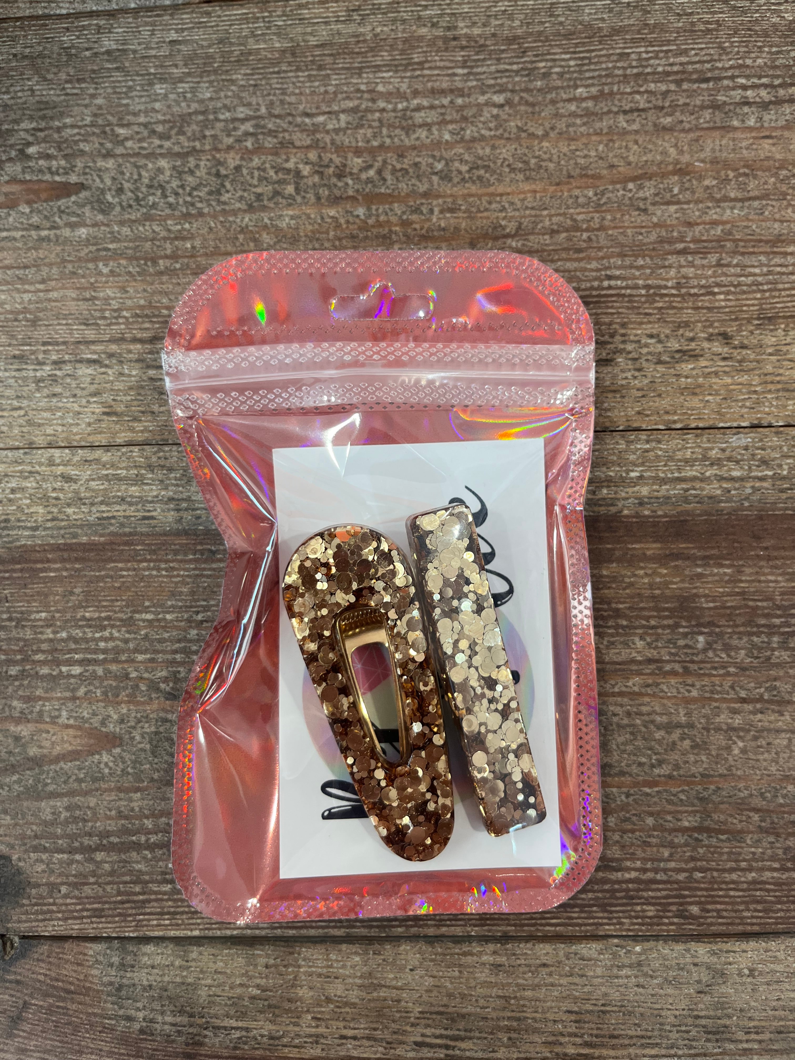 Barrettes dorées 2 en résine