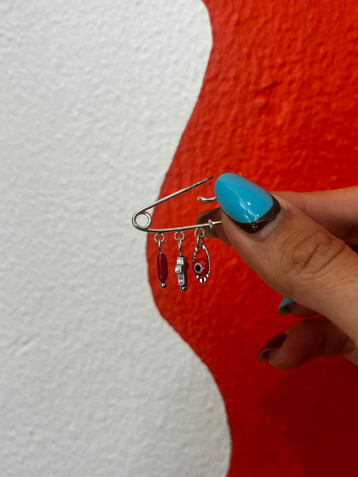 Petite broche plaquée argent