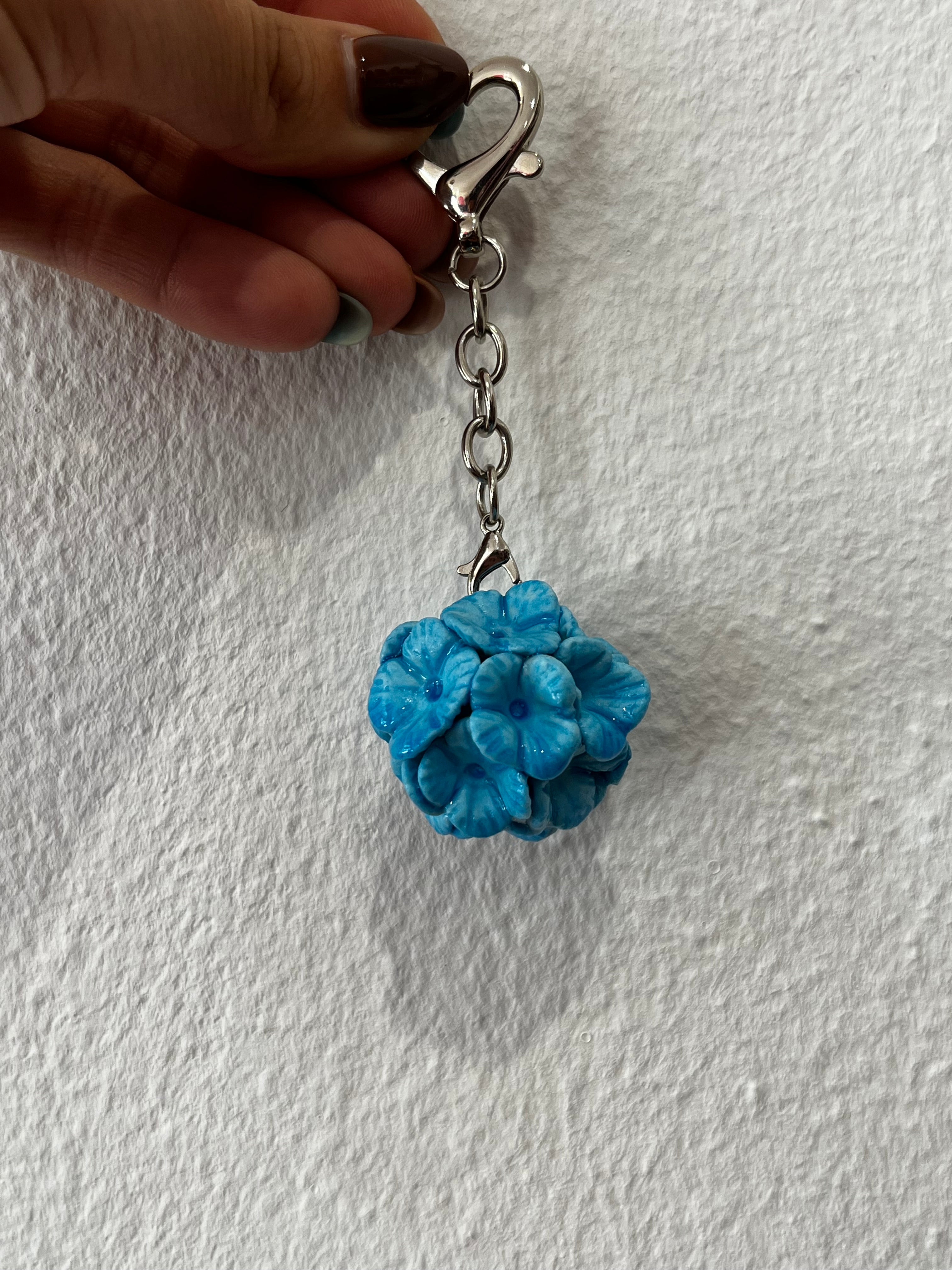 Porte clés fleur bleue