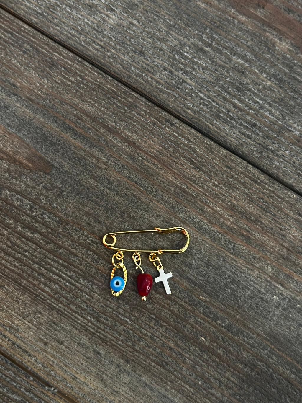 Petite broche plaquée or