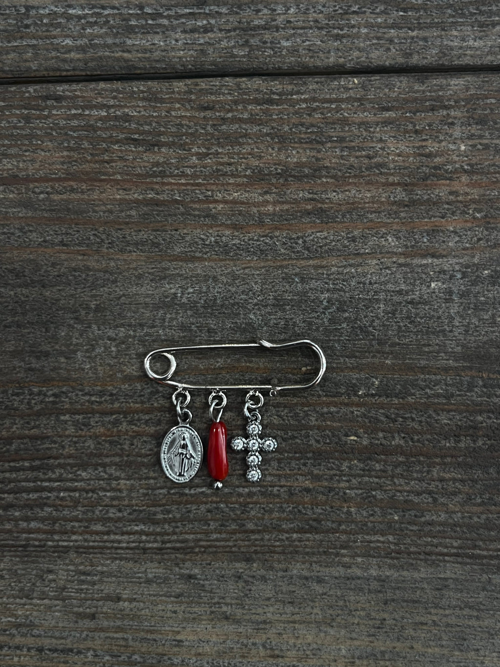 Petite broche plaquée argent