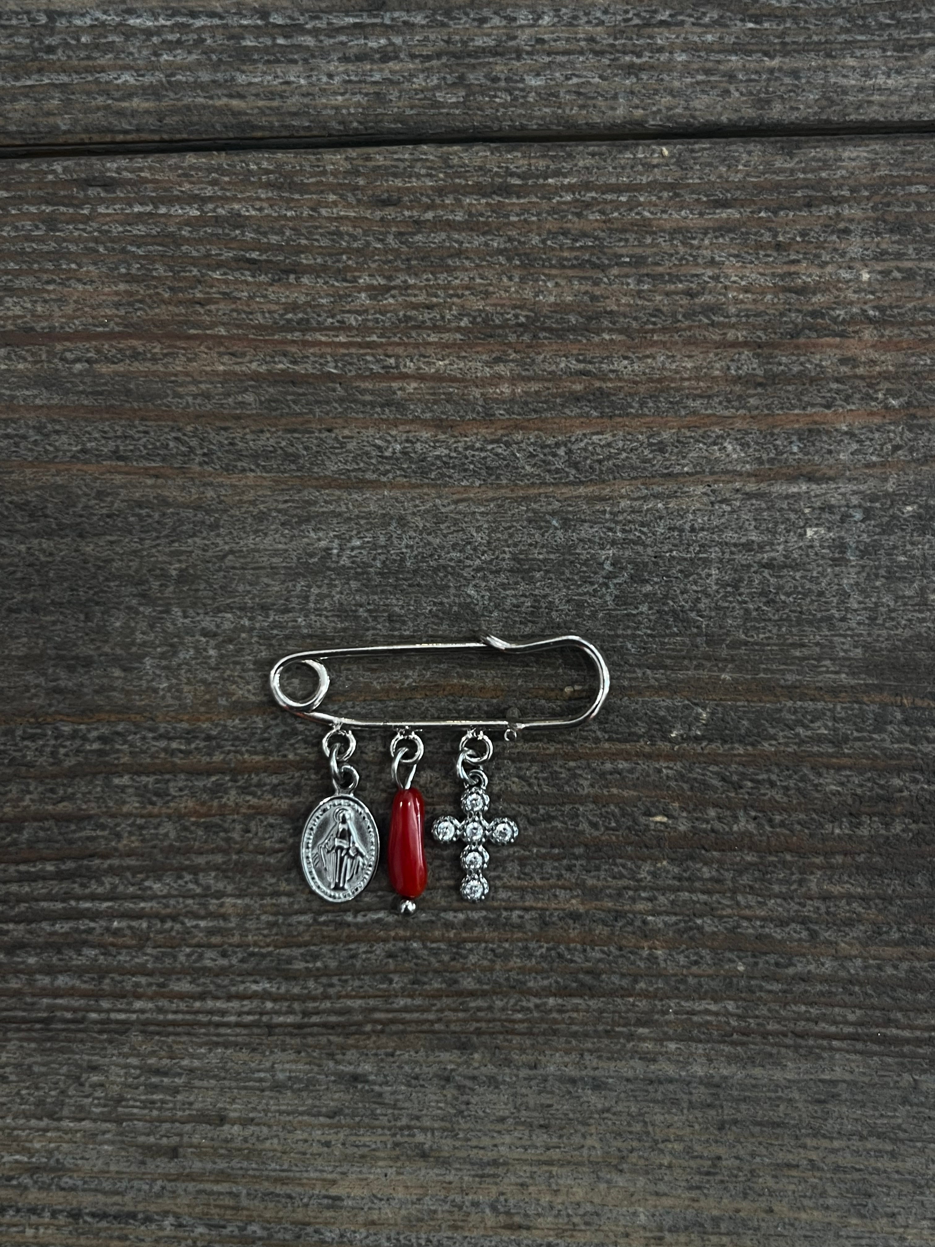 Petite broche plaquée argent