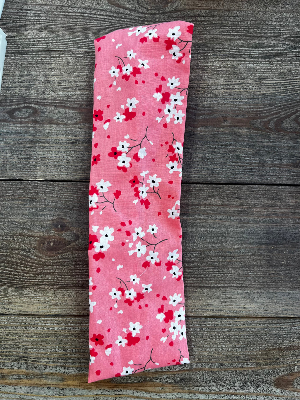 Bandeau élastique fleurs fond rose