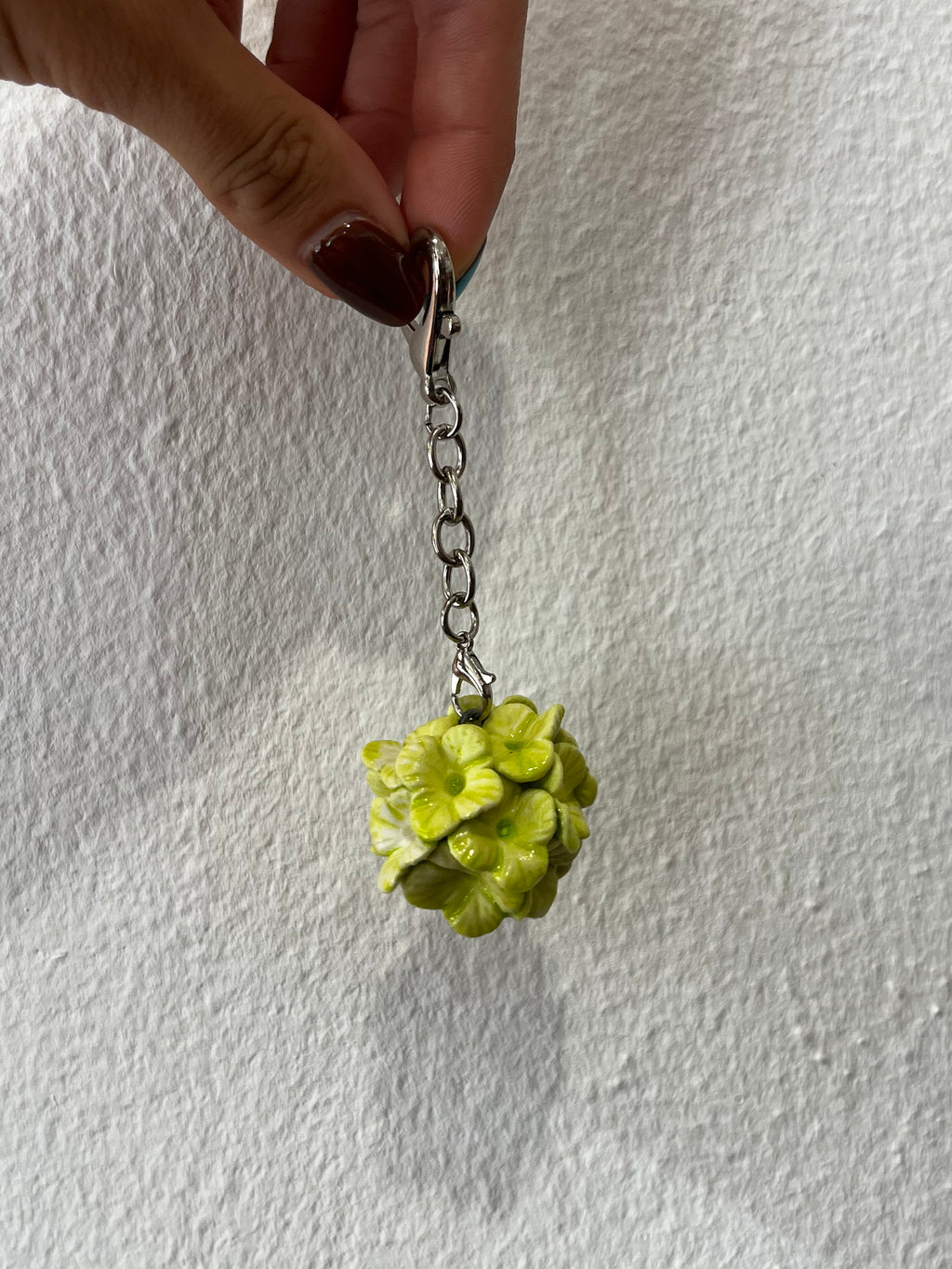 Porte clés fleur verte