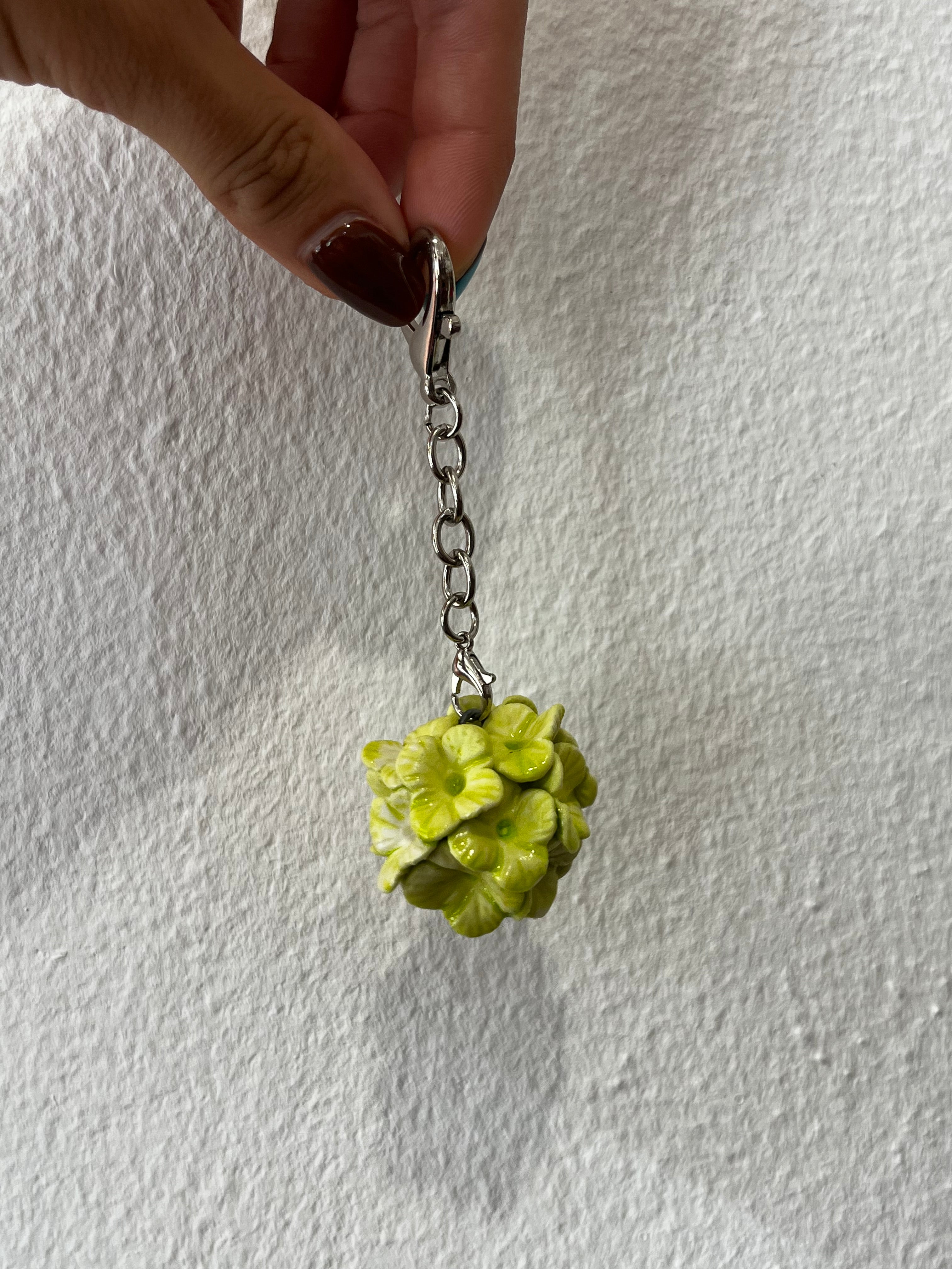 Porte clés fleur verte