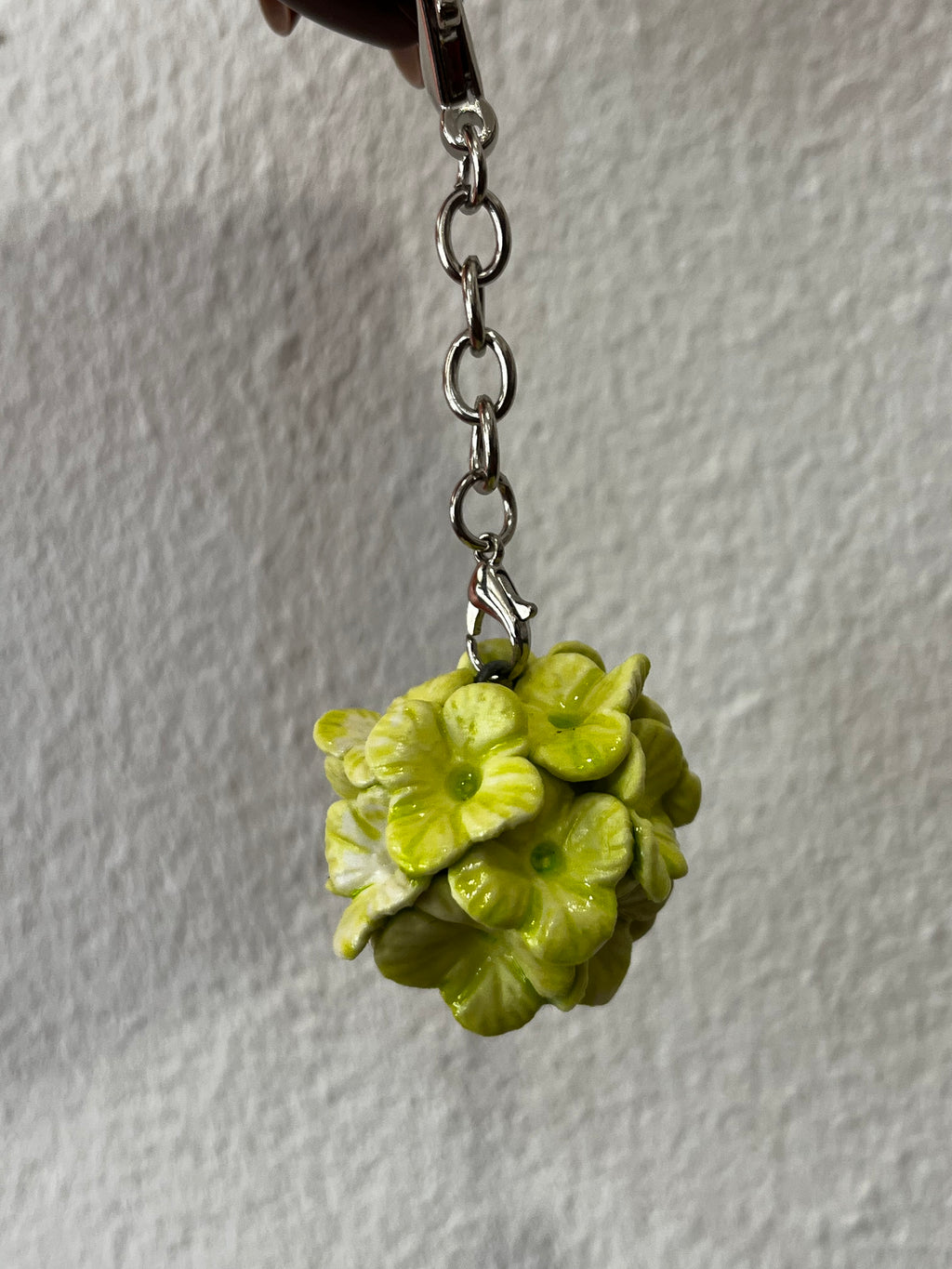 Porte clés fleur verte