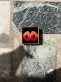 Boucle ovale orange et rose