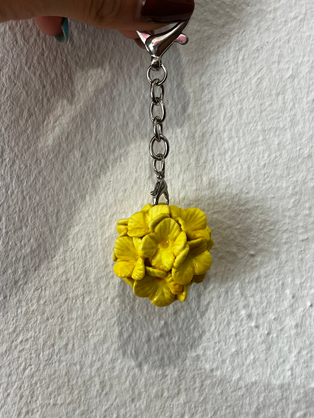 Porte clés fleur jaune