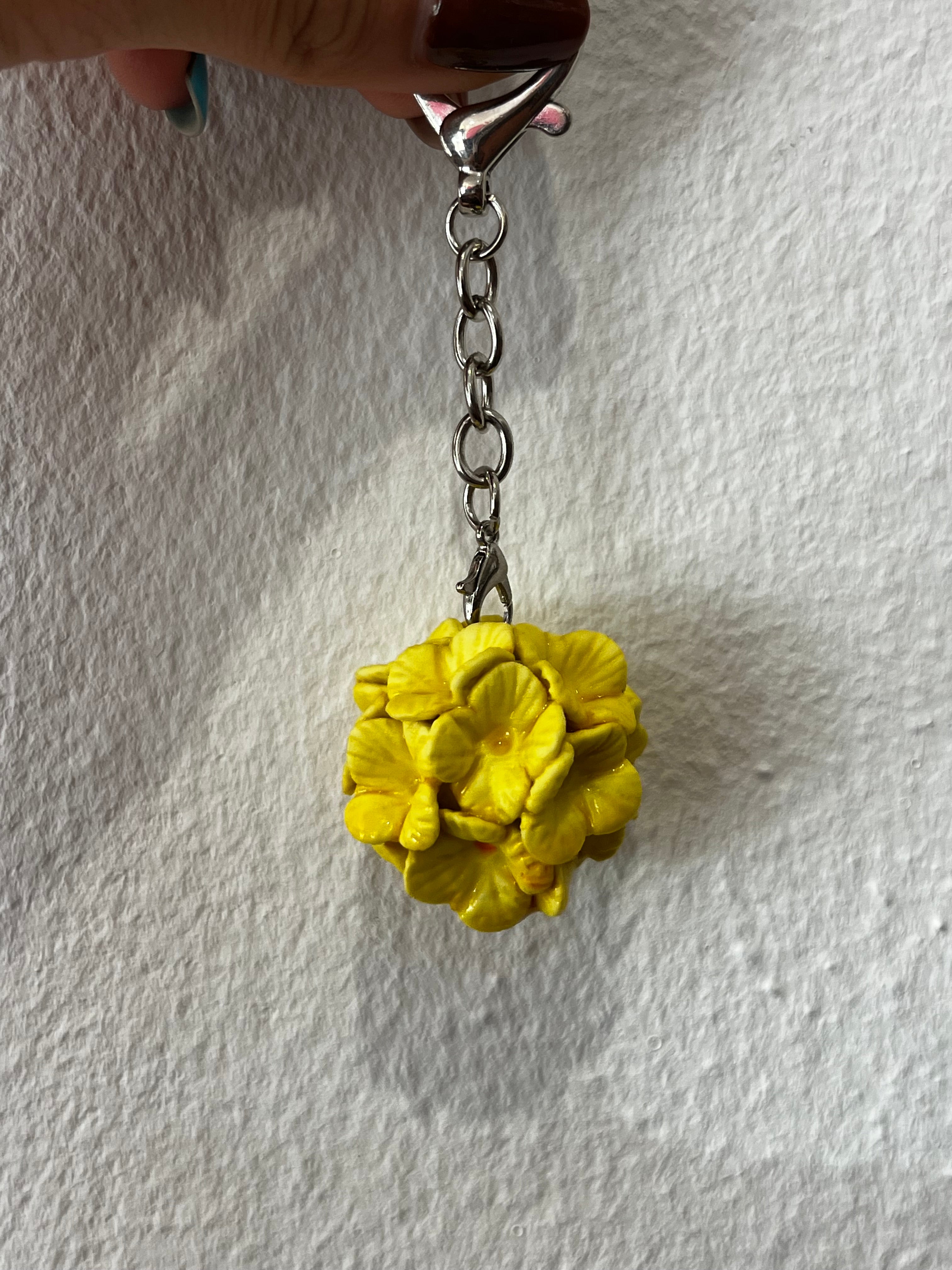 Porte clés fleur jaune