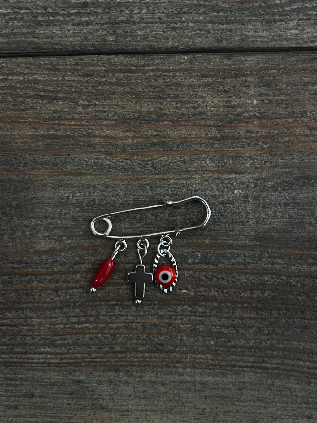 Petite broche plaquée argent