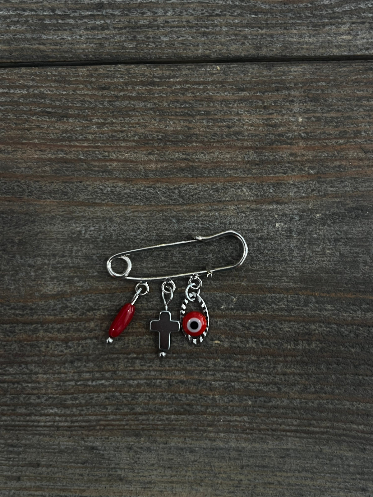 Petite broche plaquée argent