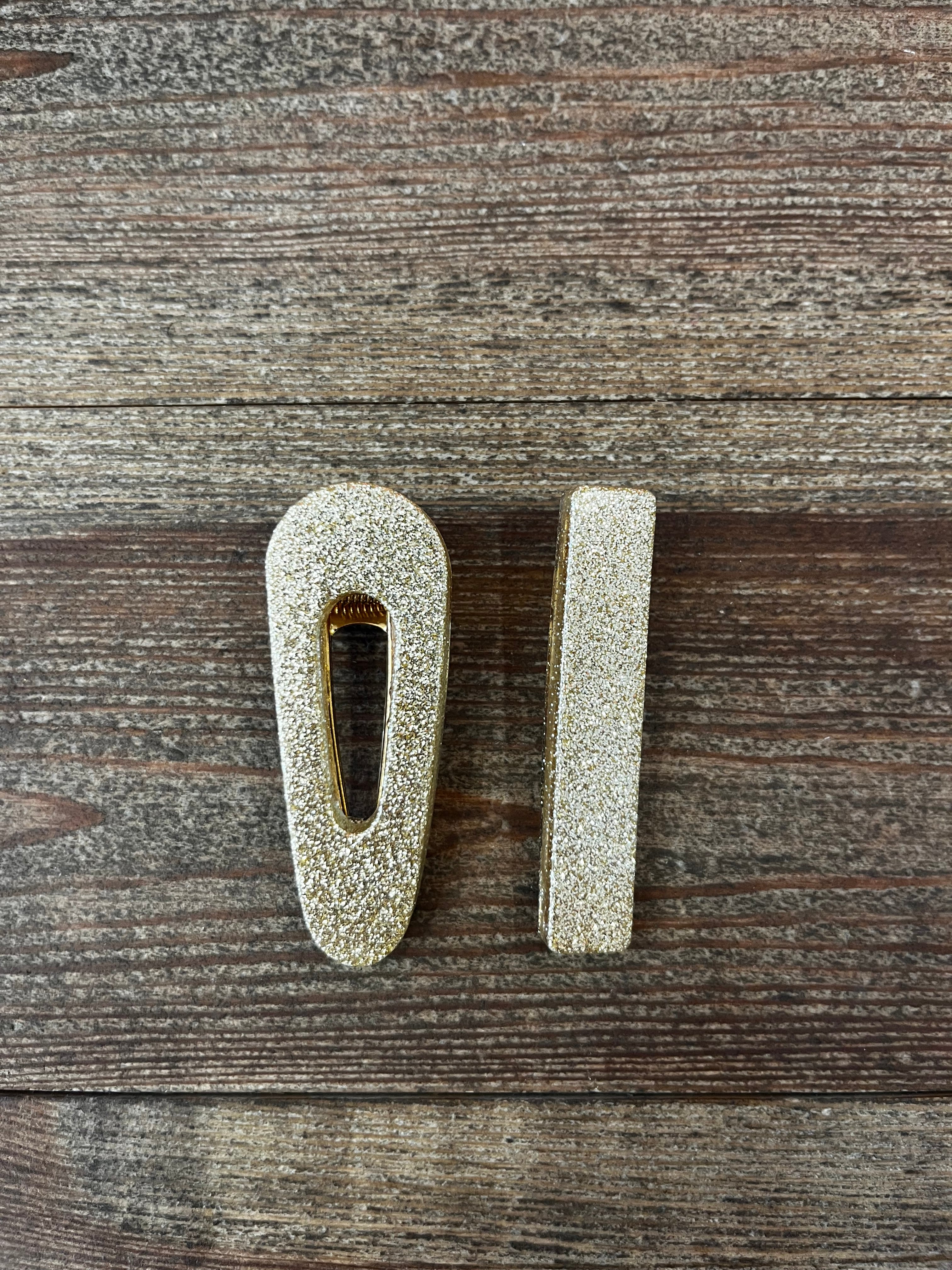 Barrettes beiges/dorées en résine